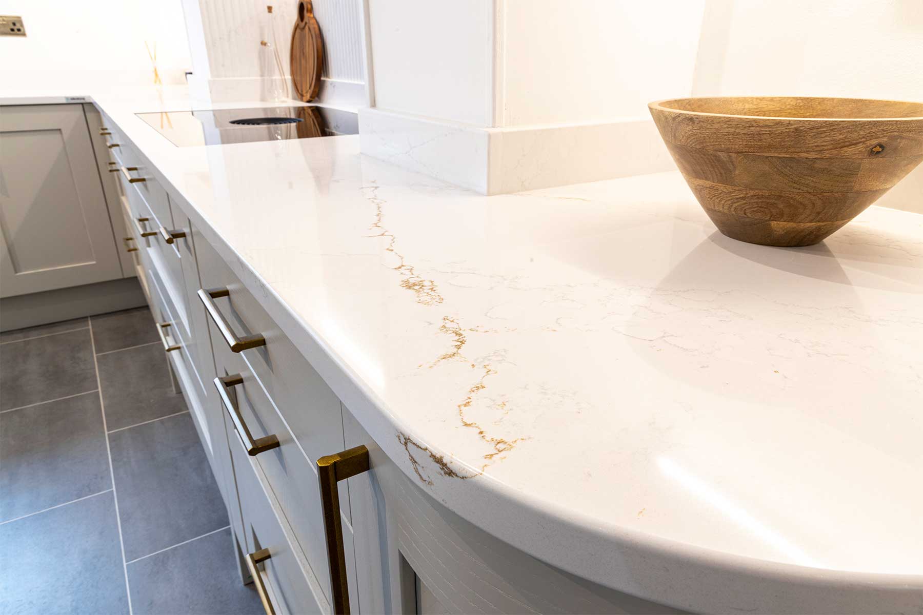 Silestone Ethereal Glow marble effect quartz worktops created for a kitchen company showroom in West Sussex
